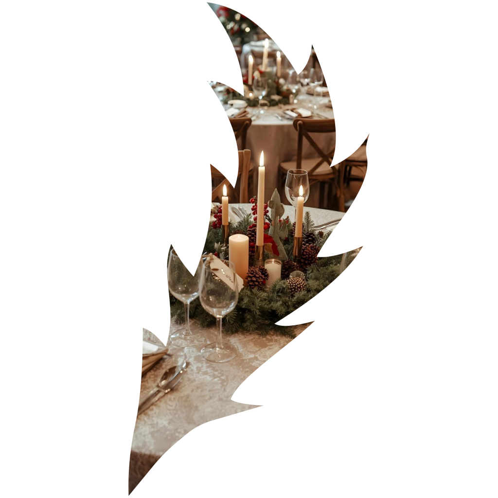 A set table with centerpiece cropped by the shape of a thistle leaf